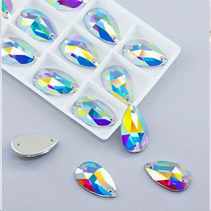 85703  SEW-ON GLASS STONES TEARDROP SHAPE WITH 2 HOLES  FOR SEWING 17X28mm/1Pcs/   CRYSTAL AB, FLAT  ,Material GLASS,,BEADS (12 0) ()