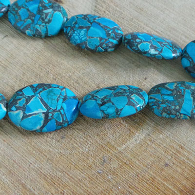 CH56547 Ημιπολυτιμοι λιθοι χαολιτης/howlite οβαλ ,25x18mm/17τεμ. ,τυρκουαζ χρωμα,πλακε (0 0)